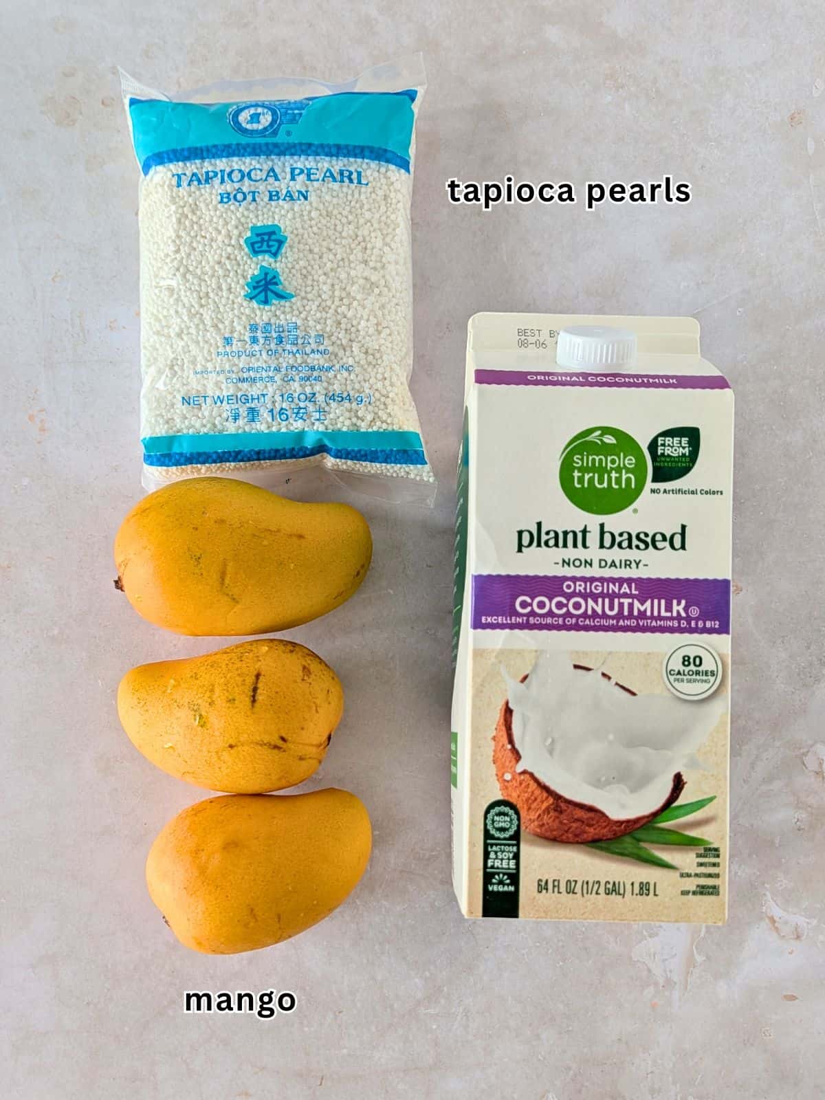 Ingredientes with text- tapioca pearls, mango, and coconut milk.