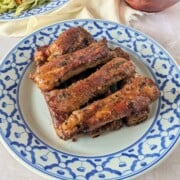 Feature image of Thai ribs on a blue plate.