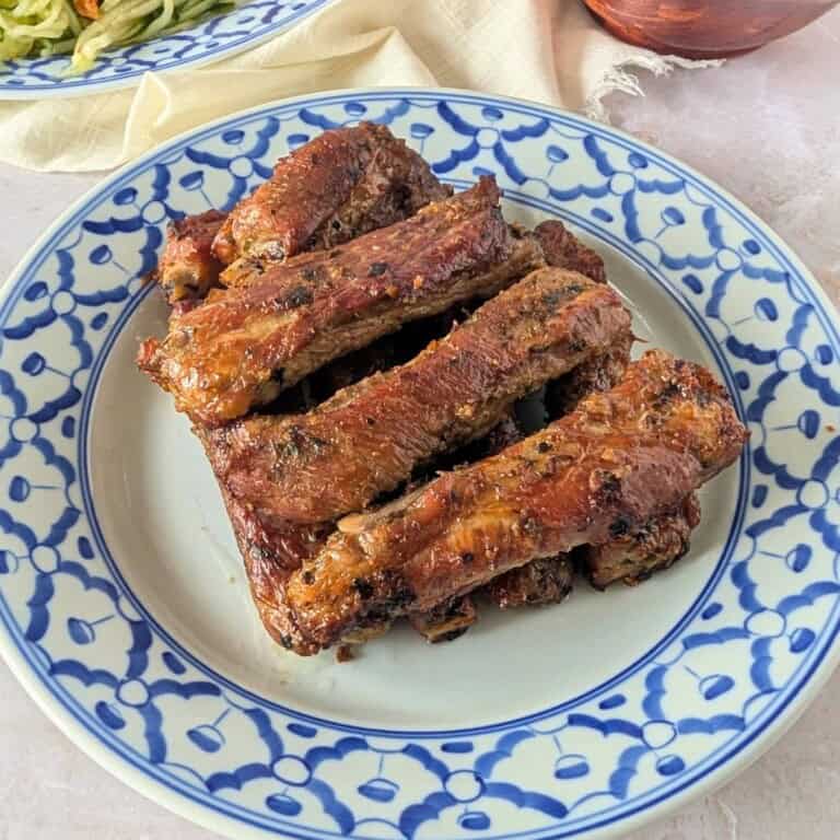 Feature image of Thai ribs on a blue plate.
